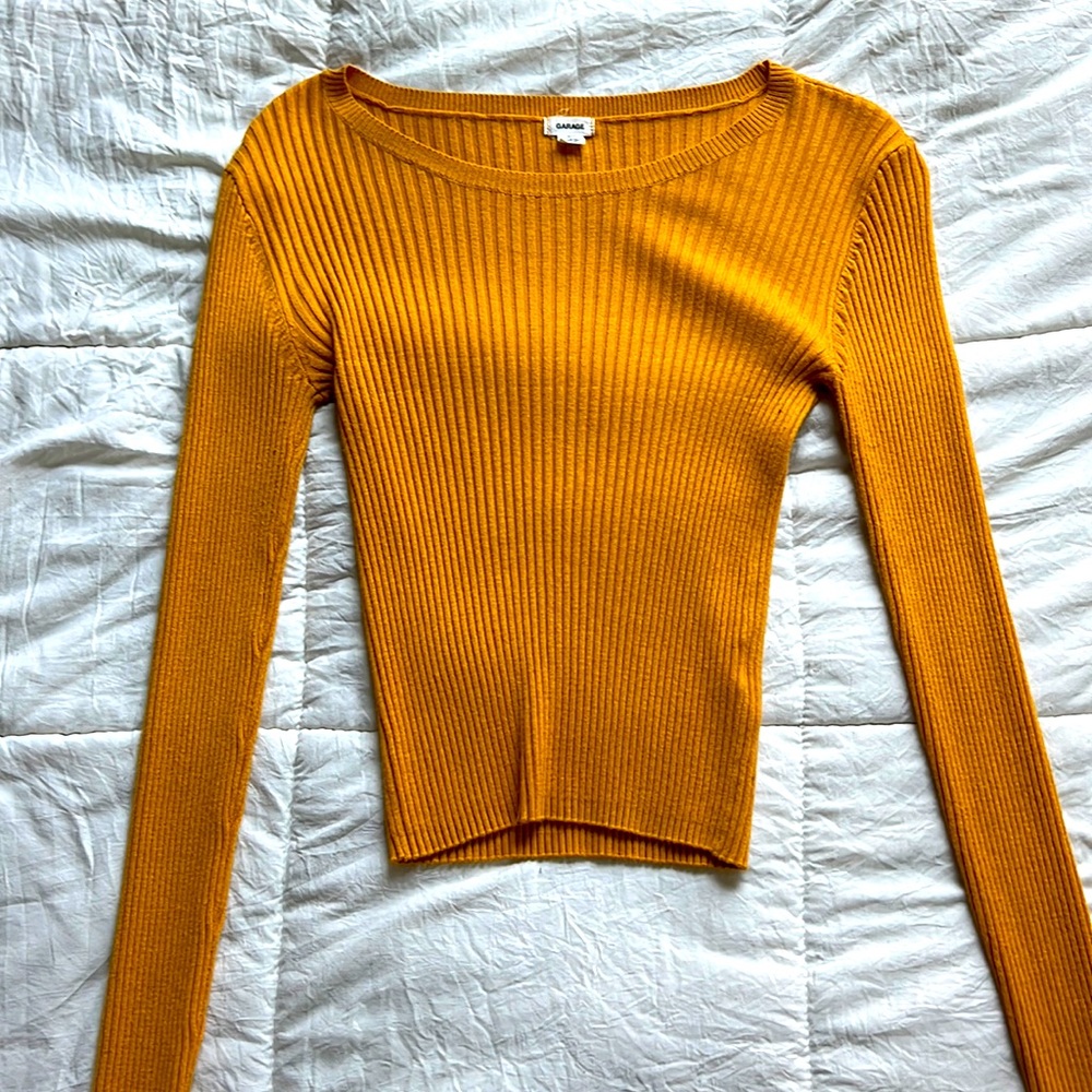 form fitting yellow sweater